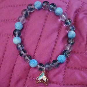 Blue and Clear Beaded Bracelet with Mermaid, tell Charm